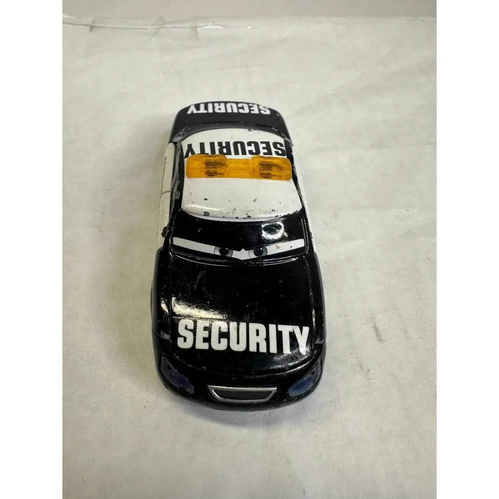 Disney Pixar Cars Marlon Clutches Security Vehicle Black White‎ Piston Cup Toy